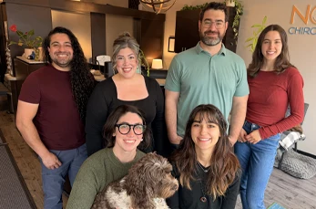 Chiropractor Berkley MI Nick Novakoski Gio Dejesus and Carlyn Molloseau With Team